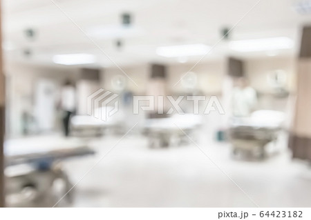 ER blur background, emergency room department in hospital with blurry medical staffs, nurses and patient stretcher beds for health care service 64423182