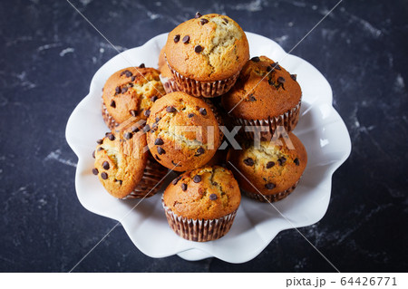 close-up of freshly baked chocolate chip muffins close-up of freshly baked chocolate chip muffins 64426771