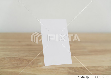 Blank business cards on wooden surface. Blank business cards on wooden surface. 64429598