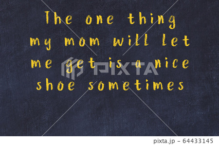 Chalk wise inscription on black chalkboard 64433145