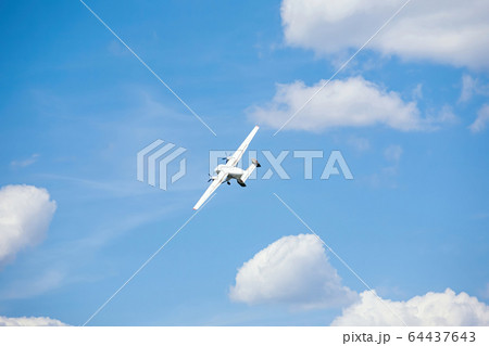 old transport plane flies at an air show 64437643