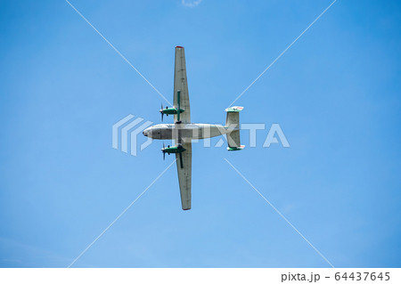 old transport plane flies at an air show 64437645