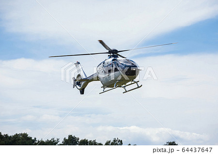 passenger helicopter flies at an air show 64437647