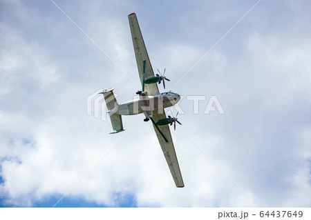 old transport plane flies at an air show 64437649