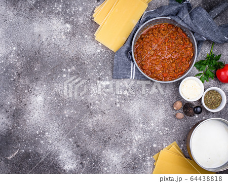 Ingredients for cooking lasagna Bolognese 64438818