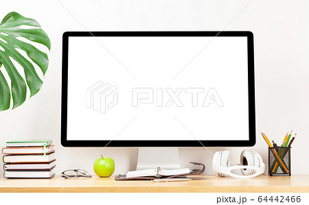 Home workspace with computer and headphones 64442466