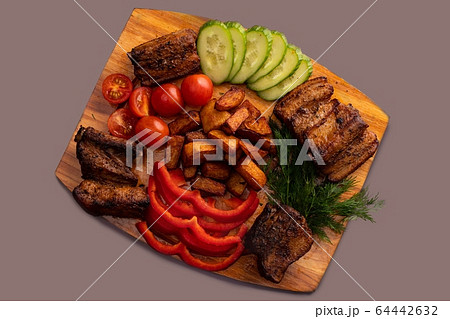 Shashlyk with salad high angle view Shashlyk with salad high angle view 64442632