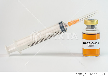 Covid-19 vaccine and syringe injection on studio white background Covid-19 vaccine and syringe injection on studio white background 64443651