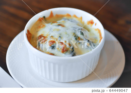Baked spinach or Baked spinach with cheese 64449047