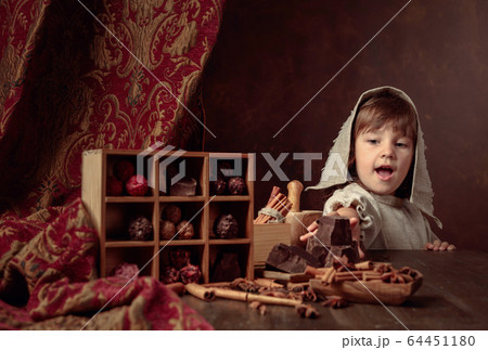 Little girl in an vintage linen dress near the Little girl in an vintage linen dress near the 64451180
