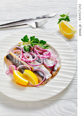 A portion of homemade swedish pickled herring A portion of homemade swedish pickled herring 64457143
