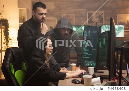 Cyber terrorist helping female hacker to break server Cyber terrorist helping female hacker to break server 64458408