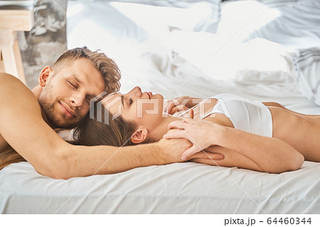 Tender brunette female person enjoying home weekend Tender brunette female person enjoying home weekend 64460344