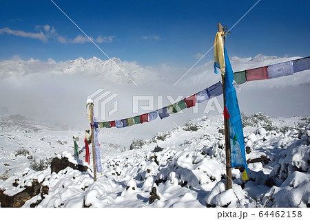Buddhist Prayer flags against Himalayas snowy Buddhist Prayer flags against Himalayas snowy 64462158