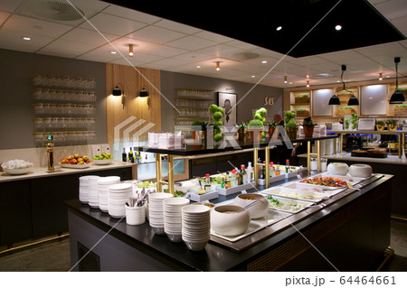 OSLO, NORWAY - JAN 21st, 2017: airport business class lounge interior of SAS, buffet and eating area in a frequent flyer lounge for SAS Gold customers, food and drinks 64464661