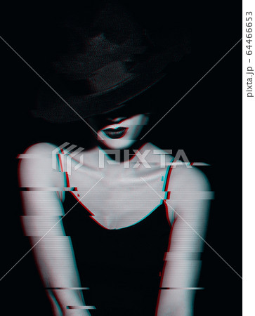 retro portrait of a woman in a dress and a classic hat on a dark background 64466653