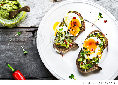 Spinach Hummus with Soft Boiled Egg on Sourdough 64467453