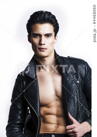 young handsome man, leather jacked on naked torso, emotional posing, white background, modern guy, lifestyle people concept young handsome man, leather jacked on naked torso, emotional posing, white background, modern guy, lifestyle people concept 64468060