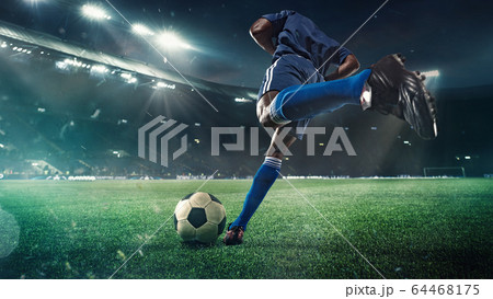 Football or soccer player in action on stadium - Stock Photo [64468175]  - PIXTA