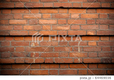 Part of old brick wall lined with steps across five rows of brickwork. Stone brick wall backdrop. Part of old brick wall lined with steps across five rows of brickwork. Stone brick wall backdrop. 64469036