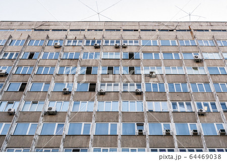 Part of wall of old concrete building with open Part of wall of old concrete building with open 64469038