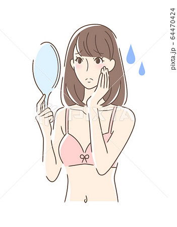不安な表情で手鏡を見る女性 64470424