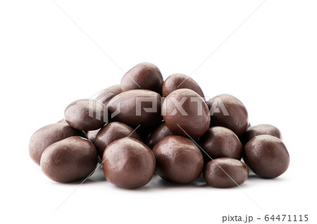 A pile of peanuts in chocolate on a white A pile of peanuts in chocolate on a white 64471115