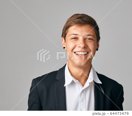 Portrait of young very happy businessman. Portrait of young very happy businessman. 64473479