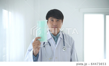 Medical concepts. The doctor is wearing a mask in Medical concepts. The doctor is wearing a mask in 64473653