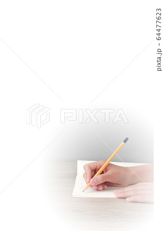 ノートに何かを書いている人の写真素材