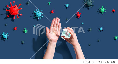 Applying sanitizer gel with epidemic influenza concept Applying sanitizer gel with epidemic influenza concept 64478166