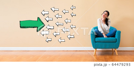 Arrow going in the opposite direction with woman in a thoughtful pose Arrow going in the opposite direction with woman in a thoughtful pose 64479293