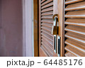 Closeup wooden door lock with copy space,Lock the door for security. 64485176