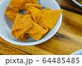 Fried crispy dumplings placed in a bowl 64485485