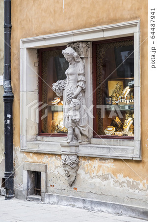 Sculpture on the window Sculpture on the window 64487941