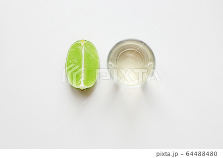 tequila and lime. still life. alcohol shot 64488480