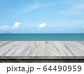 Empty concrete table top on sea and sky blurred background. 64490959