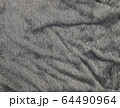 Grey cloth with feathers background. 64490964