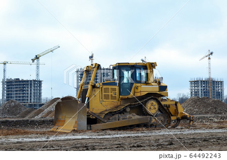 Bulldozer during of large construction jobs Bulldozer during of large construction jobs 64492243