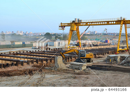 Excavator working at construction of a new metro line 64493166