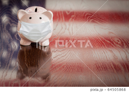Piggy Bank Wearing Medical Face Mask With American Flag Piggy Bank Wearing Medical Face Mask With American Flag 64505868
