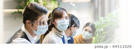 Close up businesspeople wearing medical mask prevent dust and virus in the air. 64511026