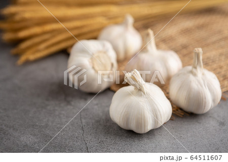Garlic on the black table Garlic on the black table 64511607