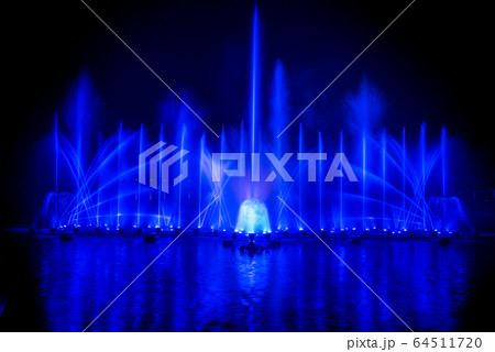 The colorful fountain dancing in celebration of year with dark night sky background. 64511720