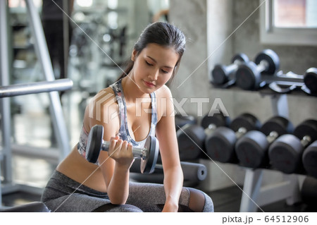 Woman exercise workout in gym 64512906