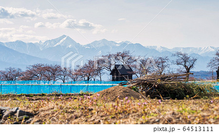Home farm and central alps in spring, Matsumoto Home farm and central alps in spring, Matsumoto 64513111