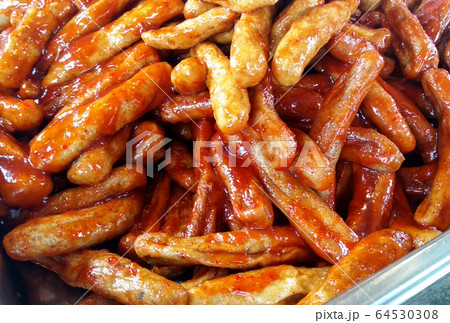 Close up of Keropok Lekor. Keropok Lekor is mainly made from fresh fish, flour, water and a few other ingredients and a popular snack in Malaysia and eat with special sauce. Sell by street hawkers. Close up of Keropok Lekor. Keropok Lekor is mainly made from fresh fish, flour, water and a few other ingredients and a popular snack in Malaysia and eat with special sauce. Sell by street hawkers. 64530308