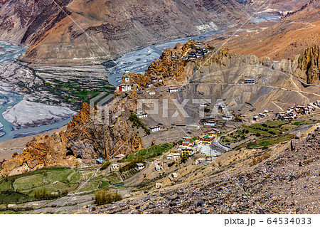 Dhankar monastry perched on a cliff in Himalayas, India 64534033