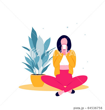 Young woman sittin at home  64536756