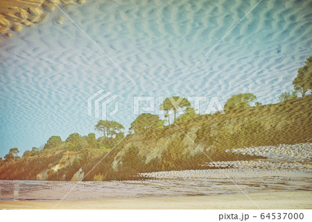 Creative reflection of seaside landscape with Creative reflection of seaside landscape with 64537000